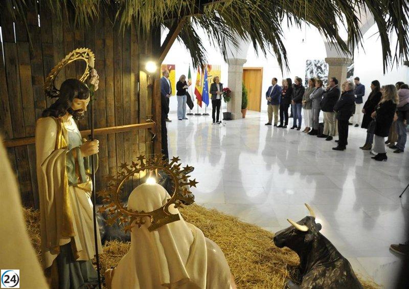 Mérida inaugura su belén municipal y dioramas de la Asociación de Belenistas de Badajoz en la Asamblea.