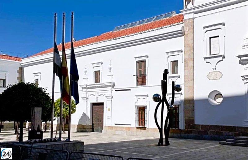 Asamblea de Extremadura rinde homenaje a Fernández Vara con banderas a media asta.