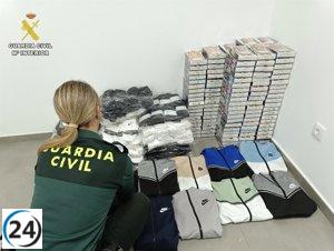 Detenido un hombre en Coria por posesión de 800 prendas de ropa falsificadas.